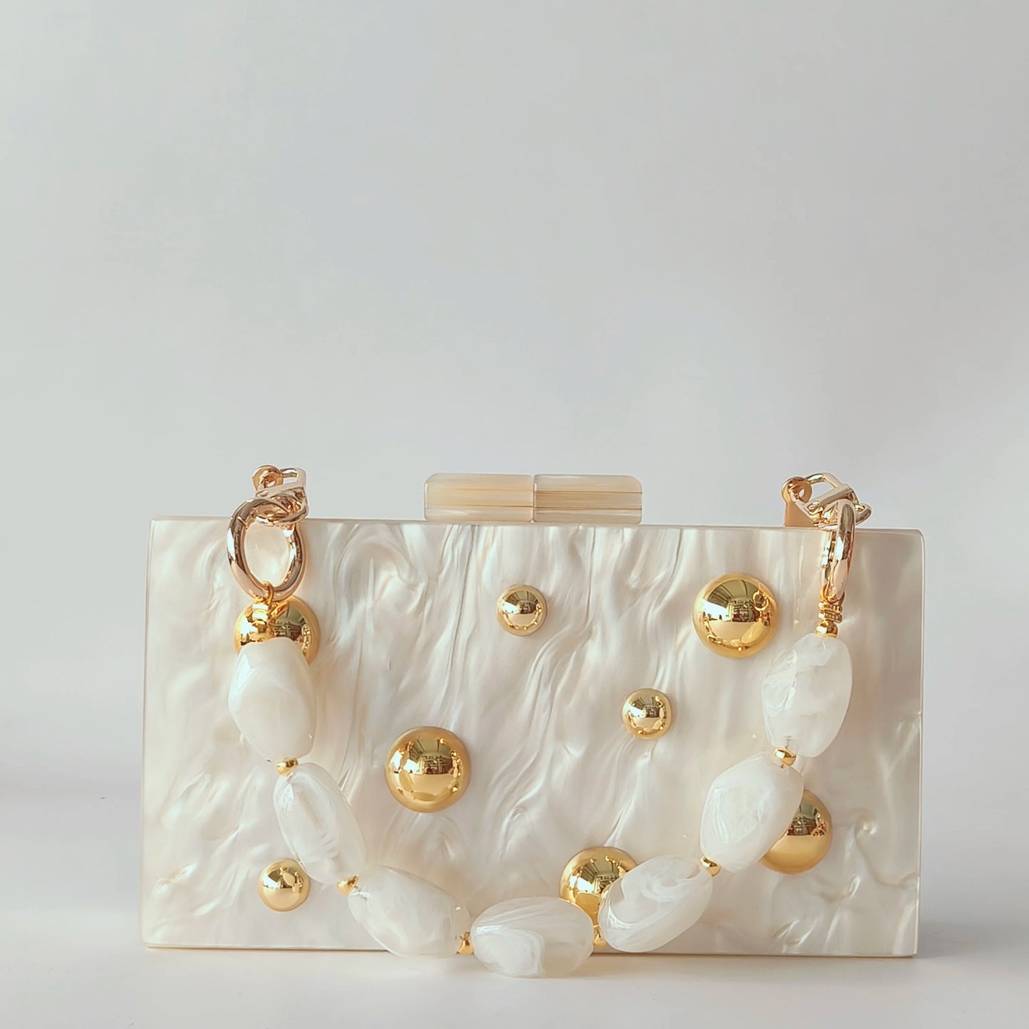 Clutch met Goudkleurige Stud Details